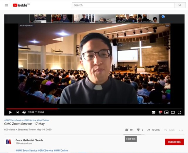 Still image from a live Zoom video recording, showing a young Chinese priest, with a lively, modern, well-attended church service in the virtual background. Screenshot of the recording of Grace Methodist Church’s “Zoom Service” on May 17, 2020. Credit: Grace Methodist Church (2020).
