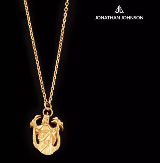 Photo of a gold necklace and logo of Jonathan Johnson.